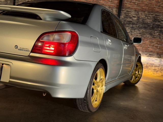 インプレッサ WRX STi HKSリーガマックスマフラー/HKSブースト計/HDDナビ/ターボタイマー/ETC/HIDヘッドライト/純正17インチアルミ/リモコンキー/AWD/6速マニュアル/ボクサーサウンド(8枚目)