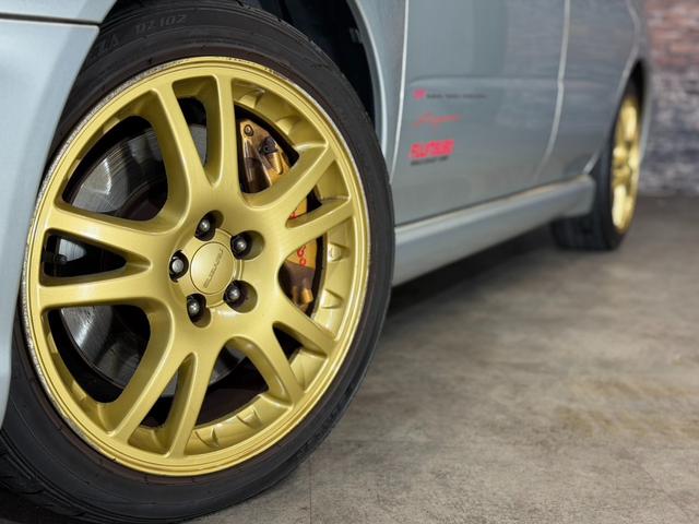 インプレッサ WRX STi HKSリーガマックスマフラー/HKSブースト計/HDDナビ/ターボタイマー/ETC/HIDヘッドライト/純正17インチアルミ/リモコンキー/AWD/6速マニュアル/ボクサーサウンド(10枚目)
