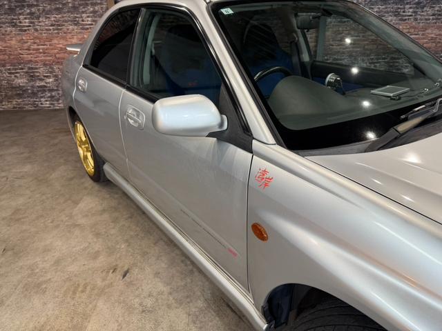 インプレッサ WRX STi HKSリーガマックスマフラー/HKSブースト計/HDDナビ/ターボタイマー/ETC/HIDヘッドライト/純正17インチアルミ/リモコンキー/AWD/6速マニュアル/ボクサーサウンド(15枚目)