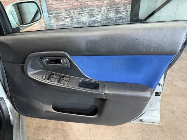 インプレッサ WRX STi HKSリーガマックスマフラー/HKSブースト計/HDDナビ/ターボタイマー/ETC/HIDヘッドライト/純正17インチアルミ/リモコンキー/AWD/6速マニュアル/ボクサーサウンド(35枚目)