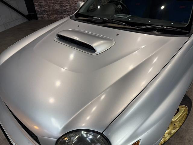 インプレッサ WRX STi HKSリーガマックスマフラー/HKSブースト計/HDDナビ/ターボタイマー/ETC/HIDヘッドライト/純正17インチアルミ/リモコンキー/AWD/6速マニュアル/ボクサーサウンド(43枚目)