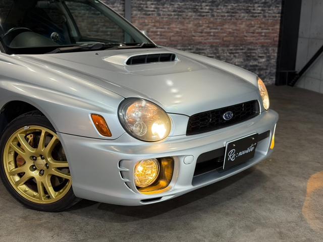 インプレッサ WRX STi HKSリーガマックスマフラー/HKSブースト計/HDDナビ/ターボタイマー/ETC/HIDヘッドライト/純正17インチアルミ/リモコンキー/AWD/6速マニュアル/ボクサーサウンド(48枚目)
