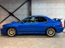 WRX STiリミテッド スバルAWD30周年記念モデル/Eg吸気効率UP/専用ECU/STIゲノムマフラー・3連追加メーター/リミテッド専用エアロパーツ/ファイナルスピード17AW/HDDナビ/CD/DVD/MD(45枚目)