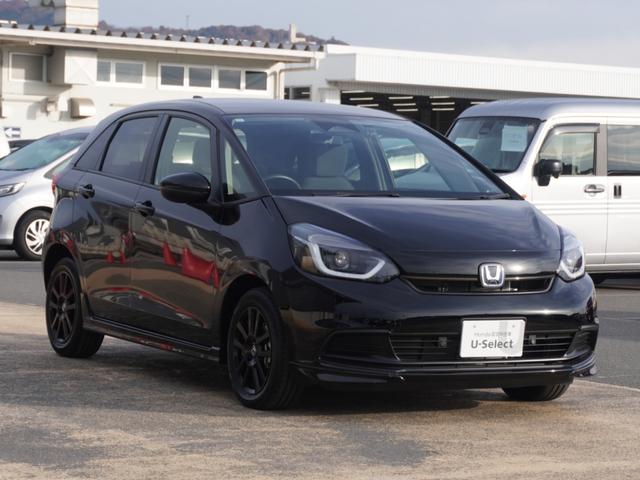 フィット ｅ：ＨＥＶホームブラックスタイル　デモカー　９インチナビ　ＢＬＡＣＫＳＴＹＬＥ専用１５インチアルミホイール　バックカメラ　ドラレコ　ＥＴＣ　アダプティブクルーズコントロール　　ＬＥＤヘッドライト　衝突被害軽減ブレーキ　禁煙車（25枚目）