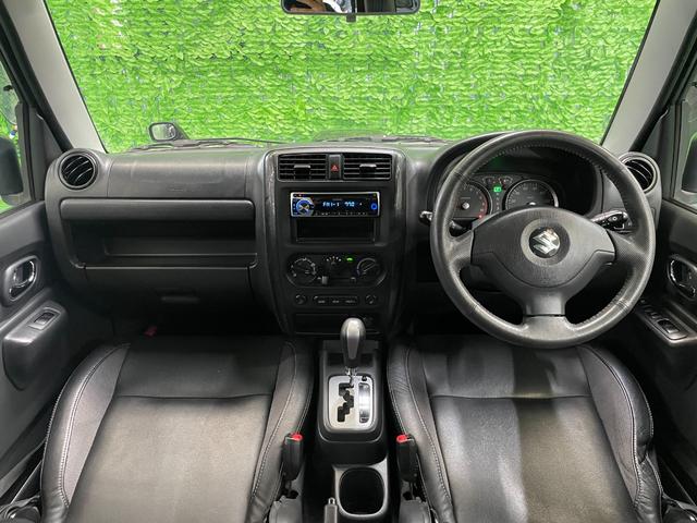 ジムニー クロスアドベンチャーＸＣ　パートタイム４ＷＤ　ターボチャージャー　ＦＭ／ＡＭラジオ　ＣＤ再生可　フォグランプ　キーレスエントリー　ハーフレザーシート　シートヒータ　純１６アルミ　電格ミラー　Ａ／Ｃ　本革ステア　禁煙　１オーナー（2枚目）