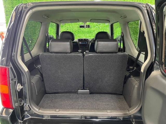 ジムニー クロスアドベンチャーＸＣ　パートタイム４ＷＤ　ターボチャージャー　ＦＭ／ＡＭラジオ　ＣＤ再生可　フォグランプ　キーレスエントリー　ハーフレザーシート　シートヒータ　純１６アルミ　電格ミラー　Ａ／Ｃ　本革ステア　禁煙　１オーナー（19枚目）