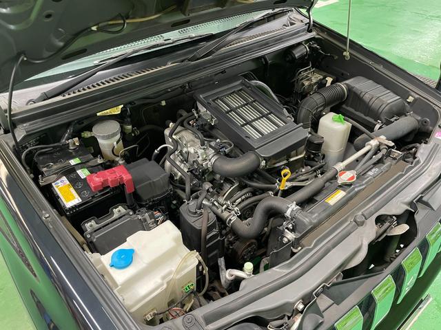 ジムニー クロスアドベンチャーＸＣ　パートタイム４ＷＤ　ターボチャージャー　ＦＭ／ＡＭラジオ　ＣＤ再生可　フォグランプ　キーレスエントリー　ハーフレザーシート　シートヒータ　純１６アルミ　電格ミラー　Ａ／Ｃ　本革ステア　禁煙　１オーナー（27枚目）