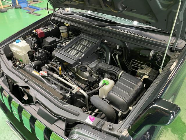 ジムニー クロスアドベンチャーＸＣ　パートタイム４ＷＤ　ターボチャージャー　ＦＭ／ＡＭラジオ　ＣＤ再生可　フォグランプ　キーレスエントリー　ハーフレザーシート　シートヒータ　純１６アルミ　電格ミラー　Ａ／Ｃ　本革ステア　禁煙　１オーナー（28枚目）
