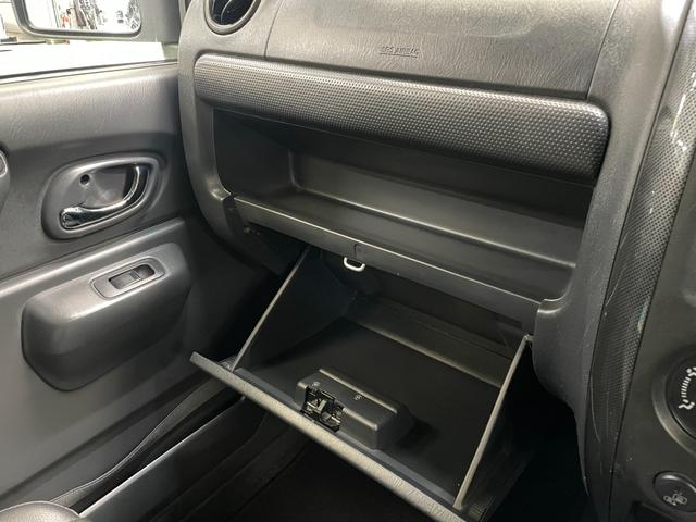 ジムニー クロスアドベンチャーＸＣ　パートタイム４ＷＤ　ターボチャージャー　ＦＭ／ＡＭラジオ　ＣＤ再生可　フォグランプ　キーレスエントリー　ハーフレザーシート　シートヒータ　純１６アルミ　電格ミラー　Ａ／Ｃ　本革ステア　禁煙　１オーナー（40枚目）