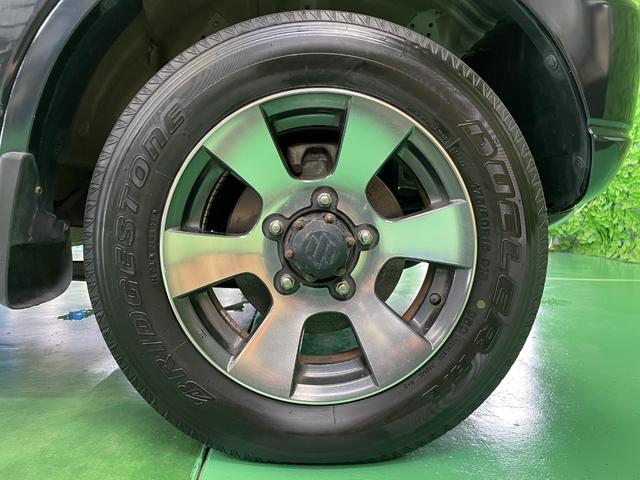 ジムニー クロスアドベンチャーＸＣ　パートタイム４ＷＤ　ターボチャージャー　ＦＭ／ＡＭラジオ　ＣＤ再生可　フォグランプ　キーレスエントリー　ハーフレザーシート　シートヒータ　純１６アルミ　電格ミラー　Ａ／Ｃ　本革ステア　禁煙　１オーナー（59枚目）