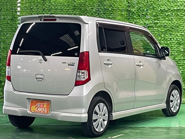 ワゴンＲ ＦＸリミテッドＩＩ　ＣＤプレイヤー　ＥＴＣ　スマートキー　ウィンカーミラー　オートエアコン　電動格納ミラー　純正エアロ　本革ステアリング　Ｗエアバッグ　純正セキュリティ　禁煙車　オゾン消臭施工済み（9枚目）