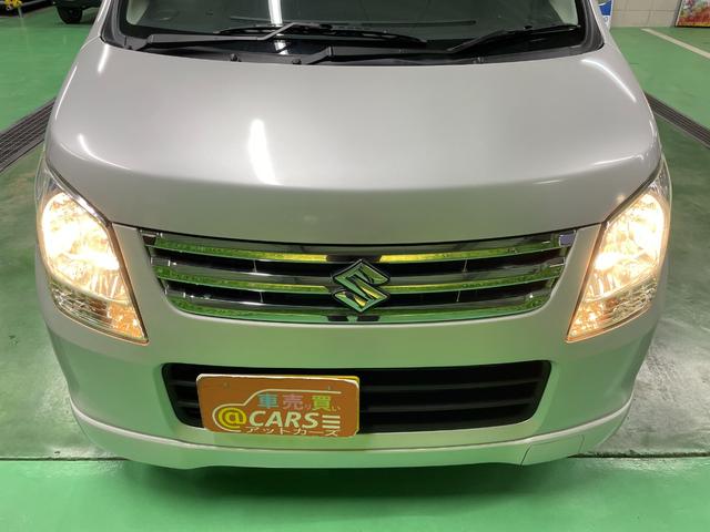 ワゴンＲ ＦＸリミテッドＩＩ　ＣＤプレイヤー　ＥＴＣ　スマートキー　ウィンカーミラー　オートエアコン　電動格納ミラー　純正エアロ　本革ステアリング　Ｗエアバッグ　純正セキュリティ　禁煙車　オゾン消臭施工済み（24枚目）