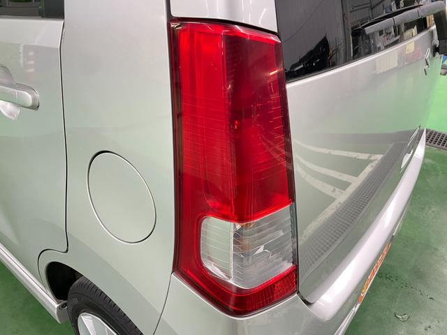 ワゴンＲ ＦＸリミテッドＩＩ　ＣＤプレイヤー　ＥＴＣ　スマートキー　ウィンカーミラー　オートエアコン　電動格納ミラー　純正エアロ　本革ステアリング　Ｗエアバッグ　純正セキュリティ　禁煙車　オゾン消臭施工済み（57枚目）