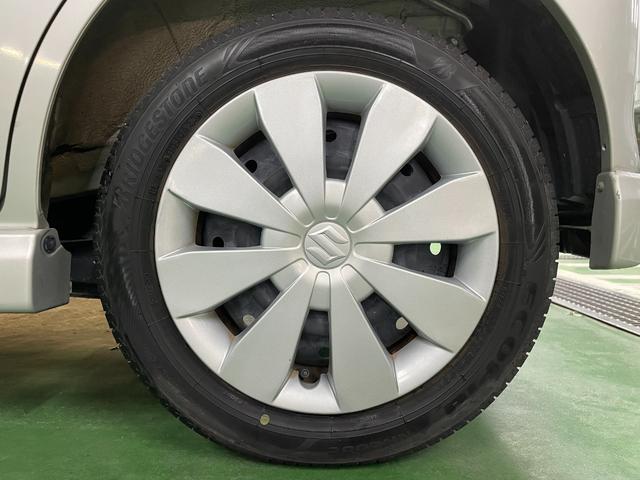 ワゴンＲ ＦＸリミテッドＩＩ　ＣＤプレイヤー　ＥＴＣ　スマートキー　ウィンカーミラー　オートエアコン　電動格納ミラー　純正エアロ　本革ステアリング　Ｗエアバッグ　純正セキュリティ　禁煙車　オゾン消臭施工済み（62枚目）