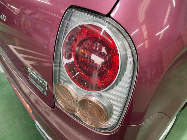 アルトラパンショコラ Ｘ　メモリーナビ　地デジＴＶ　ＣＤプレイヤー　オートライト　ＨＩＤヘッド　スマートキー　レザーシート　１４インチアルミ　オートエアコン　電格ミラー　純正セキュリティ　本革ステアリング　Ｗエアバッグ　禁煙車（64枚目）