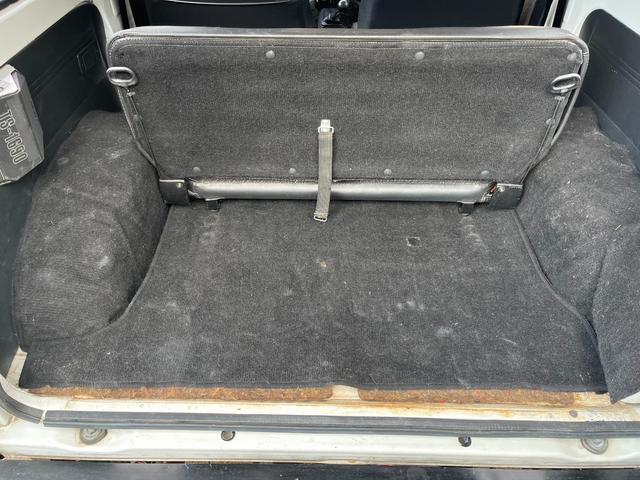 ジムニー ワイルドウインドリミテッド　４ＷＤ　ターボ　５ＭＴ　オーバーフェンダー　マッドタイヤ　ホワイトレター（22枚目）