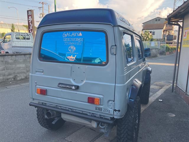 ジムニー 　パノラミックルーフ　４ＷＤ　５速ミッション　リフトアップ　エアコン　パワステ　オーバーフェンダー　社外１６アルミホイール　ＬＥＤヘッドライト　社外マフラー　２３５／８５ｒ１６タイヤ　電動ウィンチ（46枚目）