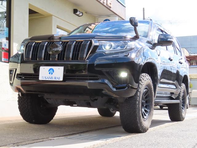 ランドクルーザープラド ＴＸ　Ｌパッケージ・ブラックエディション　１オーナーユーザー様買取禁煙車　２インチリフトＵＰ　ＤＦ１７ＡＷ　ＢＦグッドリッチＡ／Ｔ　ＳＲ　７人乗り　アルパイン９インチナビＴＶ　　Ｂカメラ　ルーフキャリア　ヒッチメンバー　Ｓヒーター／エアコン（57枚目）