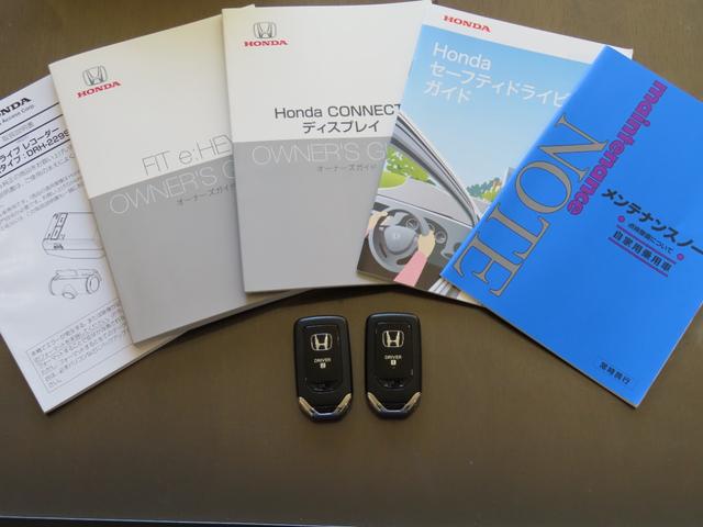 フィット e:HEV RS 1オーナーユーザー様買取禁煙車 9インチワイドCONNECTディスプレー ホンダセンシング ドライブモードスイッチ 専用サスペンション グレープライムスムースコンビシート 3ビュー切替式Rワイドカメラ(5枚目)
