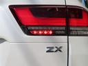 ＺＸ　１オーナーユーザー様買取禁煙車　リヤエンターテイメント　ＣＯＯＬＢＯＸ　寒冷地仕様　リヤ電動デフロック　Ｒレール　タイヤ空気圧警報　モデリスタエアロキット　ＩＴＳコネクト　アルパインインナーミラー（62枚目）
