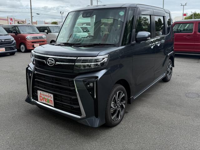 タント カスタムＸ　両側電動スライドドア　衝突被害軽減ブレーキ　電子パーキング　オートブレーキホールド　純正アルミホイール　スマートキー　運転席＆助手席シートヒーター　電動格納式ミラー　オートライト　ステアリングスイッチ（5枚目）