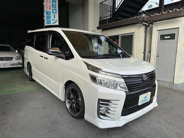 ヴォクシー ＺＳ　煌　社外ＡＷ・テール・車高調・ＴＲＤエアロ・カロッツェリアナビ・地デジ・ＤＶＤ・Ｂｌｕｅｔｏｏｔｈ・バックカメラ・ＥＴＣ・両側パワスラ・革調シート・後部モニタ・ドラレコ（2枚目）