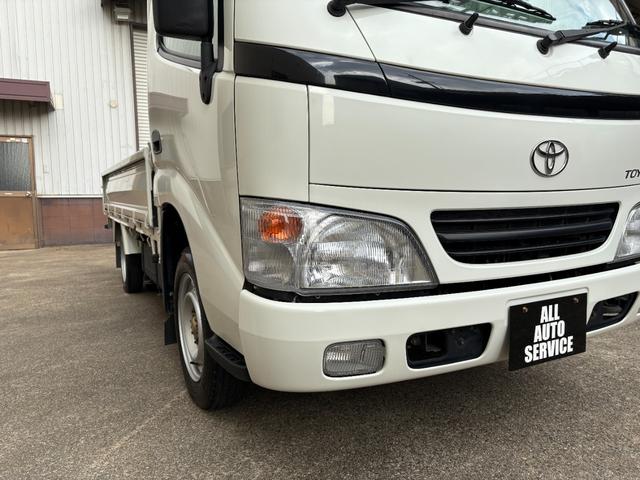 トヨエース ロングフルジャストロー 実走行0.4万km台★4224km★修復歴無★ロング★平ボディー★4ナンバー小型貨物★三方開★低床★リアWタイヤ★集中ロック★テールゲートチェーン★3人乗り★積載量1500kg★5速MT★(9枚目)