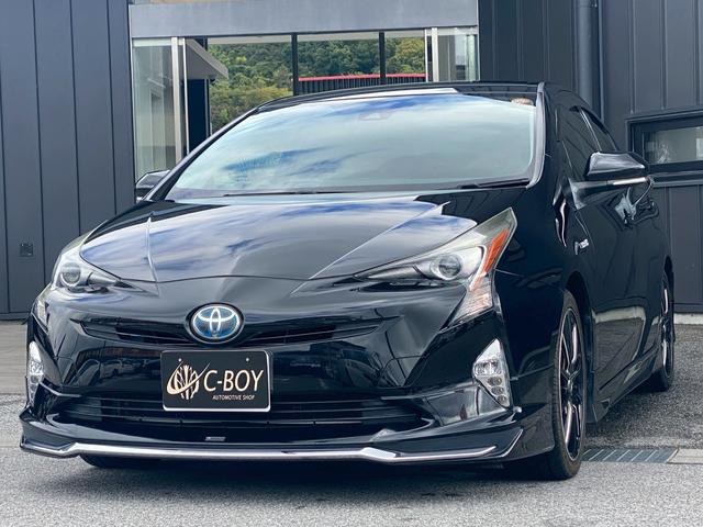 プリウス Sツーリングセレクション 純正9インチナビ ブルートゥース ビルトインETC ステアリングリモコン 合皮シート 社外18インチアルミ フルセグTV バックカメラ シートヒーター クルーズコントロール 革巻きステアリング(5枚目)