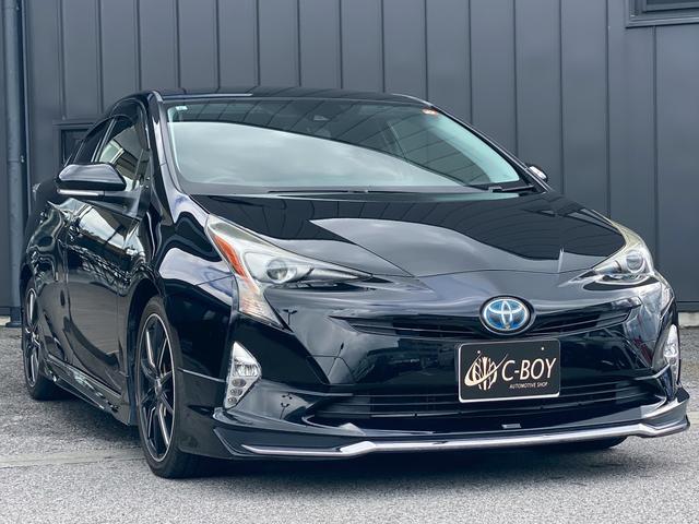 プリウス Sツーリングセレクション 純正9インチナビ ブルートゥース ビルトインETC ステアリングリモコン 合皮シート 社外18インチアルミ フルセグTV バックカメラ シートヒーター クルーズコントロール 革巻きステアリング(7枚目)