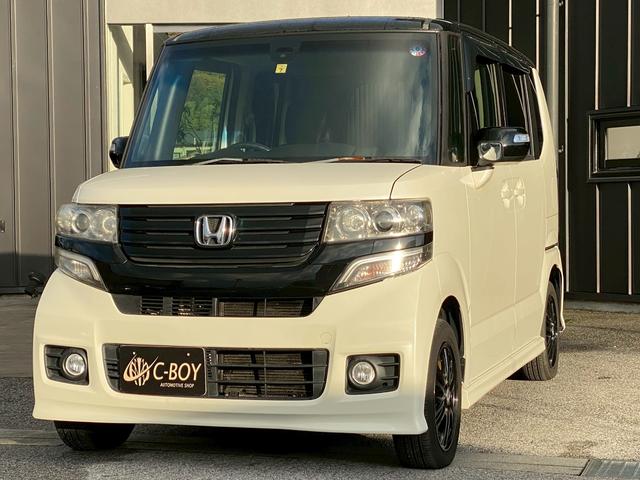 N-BOXカスタム 2トーンカラースタイル G・Aパッケージ ギャザスメモリーナビ ワンセグTV ブルートゥース バックカメラ ETC車載器 左側パワースライドドア ディスチャージヘッドライト フォグランプ ステアリングリモコン 革巻ハンドル ベンチシート(5枚目)
