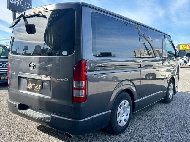 ハイエースバン ロングスーパーＧＬ　純正７インチナビ　バックカメラ　ＤＶＤ再生可　社外シートカバー　フルセグＴＶ　ＥＴＣ　ＡＣ１００Ｖ　フロアカーペット　社外エアロ（9枚目）