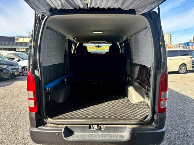 ハイエースバン ロングスーパーＧＬ　純正７インチナビ　バックカメラ　ＤＶＤ再生可　社外シートカバー　フルセグＴＶ　ＥＴＣ　ＡＣ１００Ｖ　フロアカーペット　社外エアロ（13枚目）