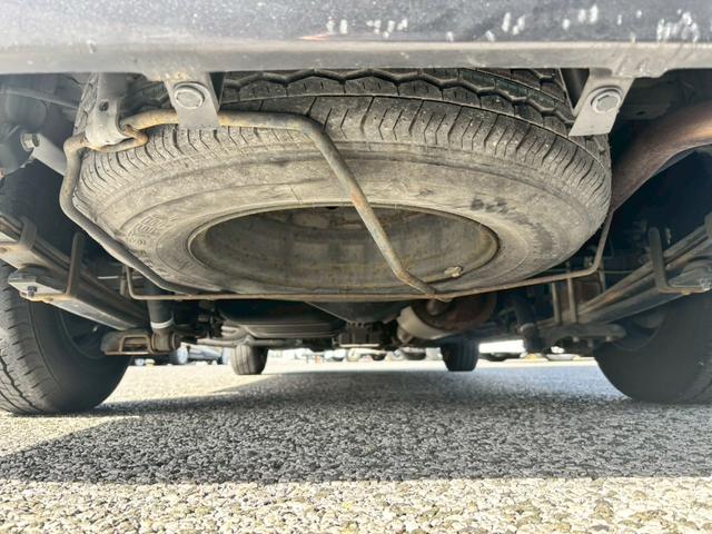 ハイエースバン ロングスーパーＧＬ　純正７インチナビ　バックカメラ　ＤＶＤ再生可　社外シートカバー　フルセグＴＶ　ＥＴＣ　ＡＣ１００Ｖ　フロアカーペット　社外エアロ（42枚目）