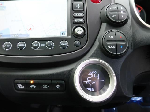 RS スカイルーフ 純正16インチアルミ 純正ナビ 地デジ バックカメラ パドルシフト 革巻きステアリング HIDヘッド キーレスエントリー ETC 禁煙車 オートエアコン オートライト プライバシーガラス(11枚目)