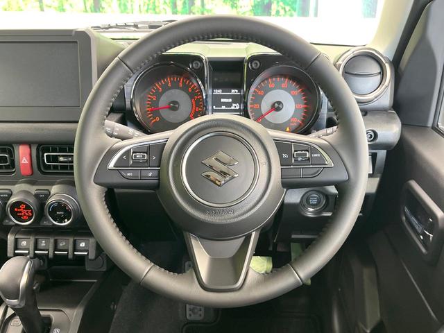 ジムニー ＸＣ　セーフディサポート　クルーズコントロール　ヘッドランプウォッシャー　ＬＥＤヘッド　フォグランプ　シートヒーター　革巻きステアリング　ステアリングスイッチ　純正１６インチアルミ　オートライト（11枚目）