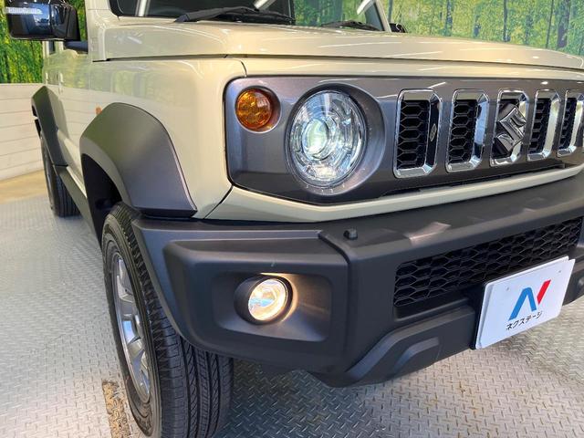 ジムニーノマド FC 禁煙車 4WD セーフティサポート アダプティブクルーズ シートヒーター LEDヘッド オートハイビーム オートエアコン 純正15インチアルミ スマートキー ヘッドランプウォッシャー(13枚目)