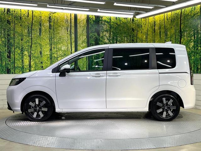 フリード エアー EX 登録済未使用車 両側電動ドア ホンダセンシング レーダークルーズ コーナーセンサー スマートキー LEDヘッド オートハイビーム 車線逸脱警報 オートライト オートエアコン 純正15インチアルミ(57枚目)