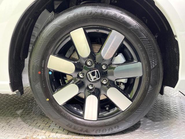 フリード エアー EX 登録済未使用車 両側電動ドア ホンダセンシング レーダークルーズ コーナーセンサー スマートキー LEDヘッド オートハイビーム 車線逸脱警報 オートライト オートエアコン 純正15インチアルミ(62枚目)