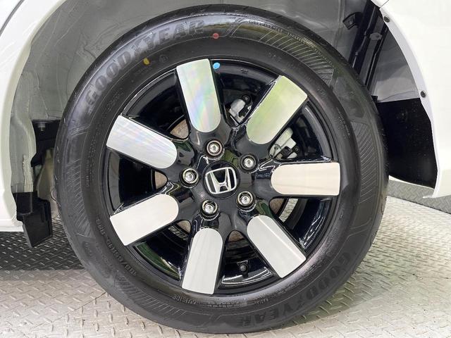 フリード エアー EX 登録済未使用車 両側電動ドア ホンダセンシング レーダークルーズ コーナーセンサー スマートキー LEDヘッド オートハイビーム 車線逸脱警報 オートライト オートエアコン 純正15インチアルミ(64枚目)