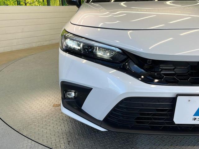 シビック e:HEV バックカメラ 衝突被害軽減システム レーダークルーズ ハーフレザーシート ドラレコ コーナーセンサー スマートキー LEDヘッド ETC2.0 オートハイビーム オートライト オートエアコン(25枚目)