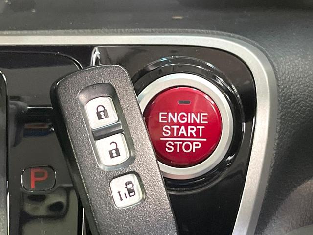 N-BOXカスタム G・Lパッケージ 禁煙車 電動スライド オートエアコン オートライト HIDヘッド スマートキー ドラレコ 電動格納ミラー CD再生 純正14インチアルミ ステアリングスイッチ アームレスト フォグランプ(6枚目)