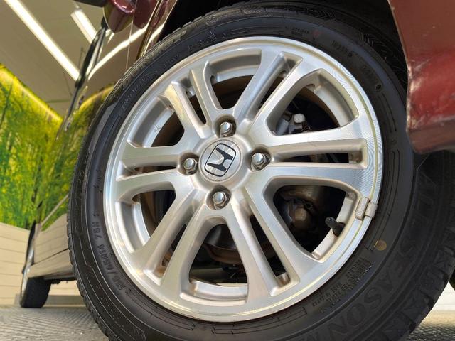 N-BOXカスタム G・Lパッケージ 禁煙車 電動スライド オートエアコン オートライト HIDヘッド スマートキー ドラレコ 電動格納ミラー CD再生 純正14インチアルミ ステアリングスイッチ アームレスト フォグランプ(12枚目)