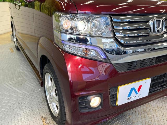 N-BOXカスタム G・Lパッケージ 禁煙車 電動スライド オートエアコン オートライト HIDヘッド スマートキー ドラレコ 電動格納ミラー CD再生 純正14インチアルミ ステアリングスイッチ アームレスト フォグランプ(13枚目)
