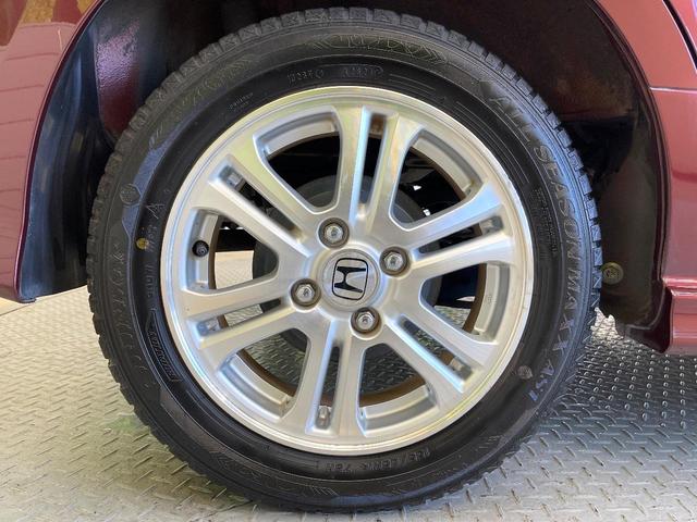 N-BOXカスタム G・Lパッケージ 禁煙車 電動スライド オートエアコン オートライト HIDヘッド スマートキー ドラレコ 電動格納ミラー CD再生 純正14インチアルミ ステアリングスイッチ アームレスト フォグランプ(52枚目)