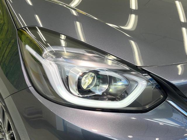 フィット e:HEVホーム 20周年特別仕様車 カーサ ホンダセンシング 純正ナビ バックカメラ フルセグ アダプティブクルーズ シートヒーター 純正16インチアルミ LEDヘッド オートハイビーム オートエアコン スマートキー ETC ドラレコ(12枚目)