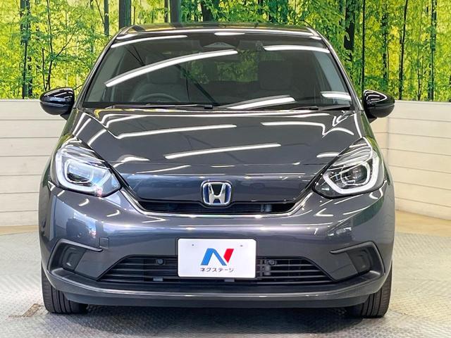 フィット e:HEVホーム 20周年特別仕様車 カーサ ホンダセンシング 純正ナビ バックカメラ フルセグ アダプティブクルーズ シートヒーター 純正16インチアルミ LEDヘッド オートハイビーム オートエアコン スマートキー ETC ドラレコ(14枚目)