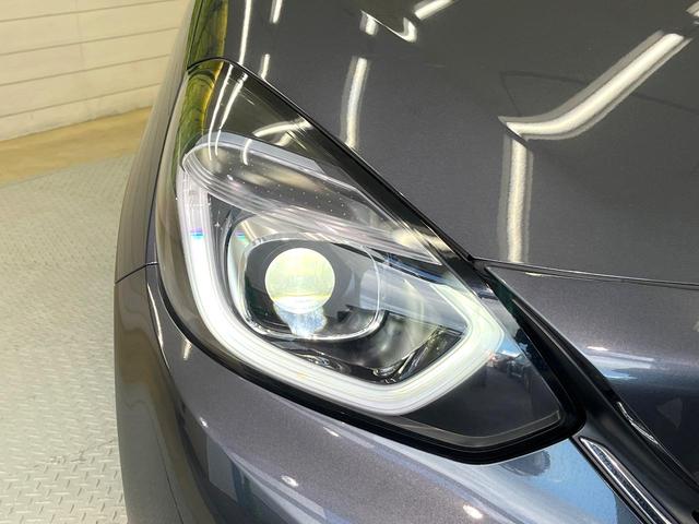フィット e:HEVホーム 20周年特別仕様車 カーサ ホンダセンシング 純正ナビ バックカメラ フルセグ アダプティブクルーズ シートヒーター 純正16インチアルミ LEDヘッド オートハイビーム オートエアコン スマートキー ETC ドラレコ(21枚目)