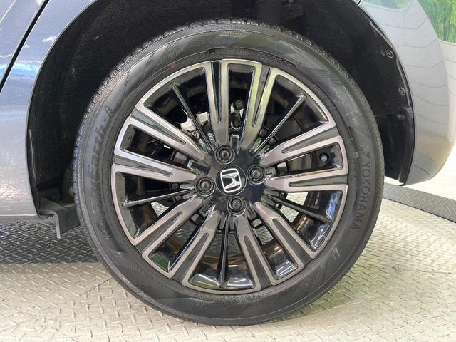 フィット e:HEVホーム 20周年特別仕様車 カーサ ホンダセンシング 純正ナビ バックカメラ フルセグ アダプティブクルーズ シートヒーター 純正16インチアルミ LEDヘッド オートハイビーム オートエアコン スマートキー ETC ドラレコ(27枚目)