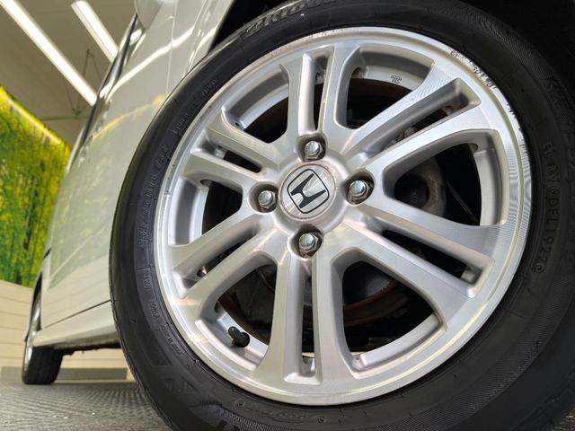 N-BOXカスタム G・Lパッケージ 電動スライドドア 純正SDナビ バックカメラ 禁煙車 スマートキー HIDヘッド ETC オートエアコン 純正14インチアルミ CD DVD再生 地デジ 電動格納ミラー(13枚目)