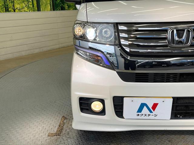 N-BOXカスタム G・Lパッケージ 電動スライドドア 純正SDナビ バックカメラ 禁煙車 スマートキー HIDヘッド ETC オートエアコン 純正14インチアルミ CD DVD再生 地デジ 電動格納ミラー(23枚目)